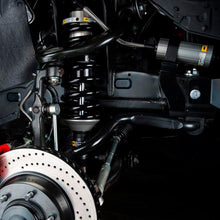 Load image into Gallery viewer, A close up of a vehicle&#39;s Old Man Emu shock absorber body in the suspension system.