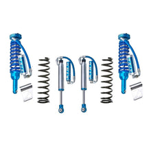 Load image into Gallery viewer, A set of King Shocks blue springs with advanced valving technology on a white background.