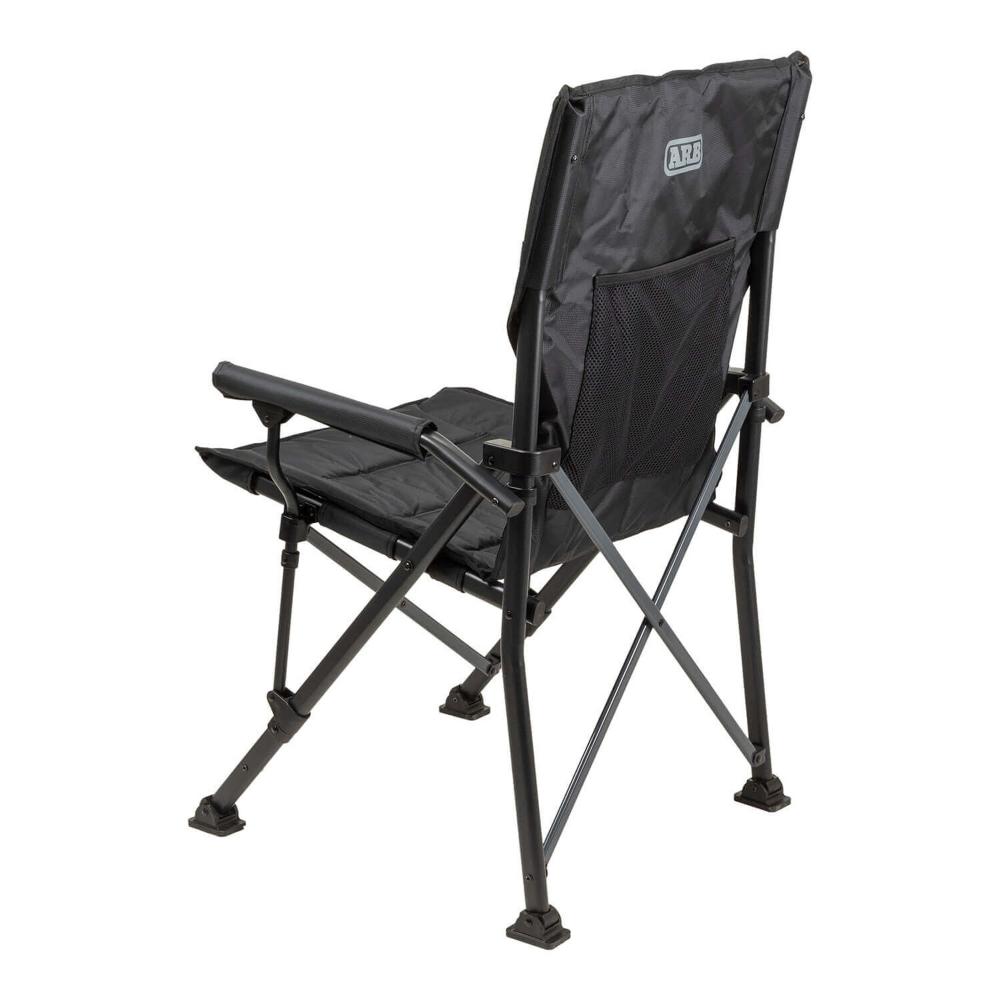 ARB Base Camp Chair 10500151 with heavy-duty steel frame, padded armrests, rear mesh storage pocket, and stable flexible feet