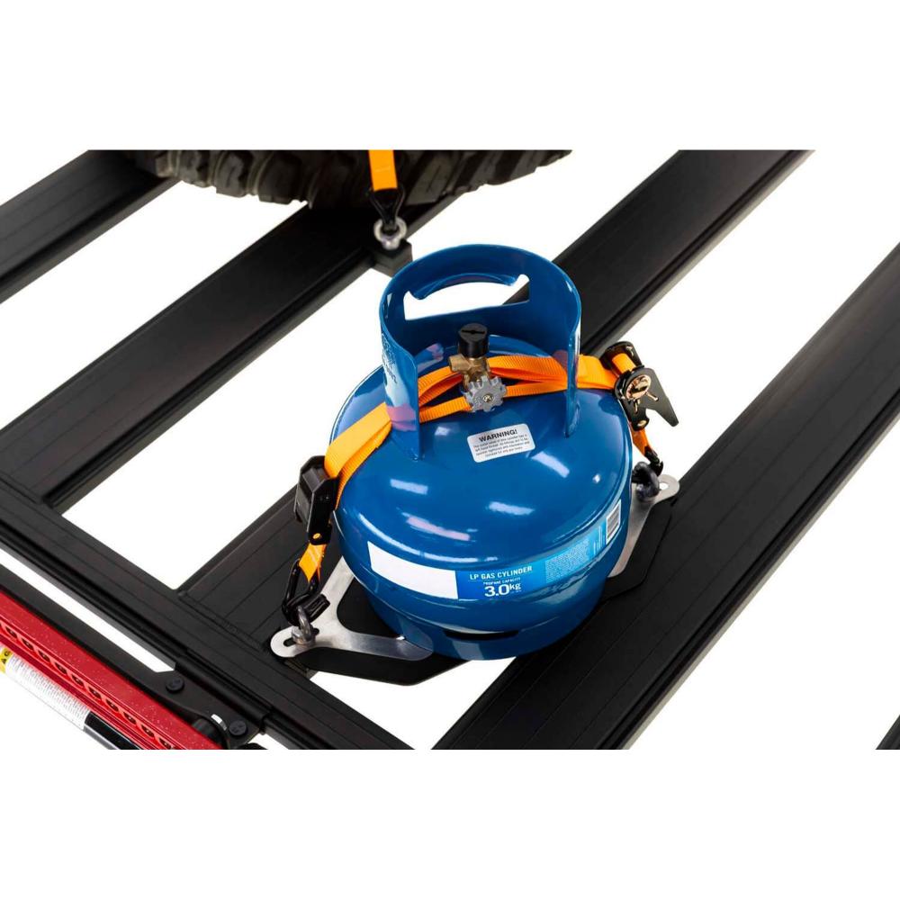 ARB Base Roof Rack Gas Bottle Holder 1780250 with adjustable stainless steel brackets, ratchet straps, securing gas bottle on roof rack