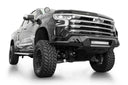 Addictive Desert Designs Black Label Front Bumper on lifted 2022-2024 Chevrolet Silverado 1500 with off-road tires and LED lighting