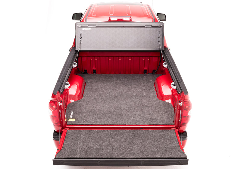 bak BAKFlip G2 Hard Folding Tonneau Cover 226446 for Toyota Tacoma (24-ON) showing folded panels and bed liner protection
