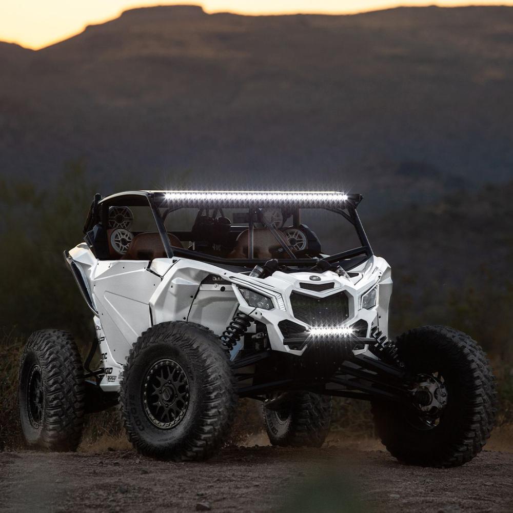 Rigid Industries 10in Radiance Plus SR-Series Single Row LED Light Bar with 8 Backlight Options mounted on lifted white off-road UTV