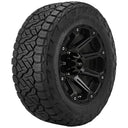 Nitto Recon - 285/70R17 - Set of 4 Tires mounted on black off-road wheel with aggressive all-terrain tread pattern