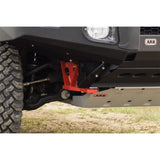 The front end of a truck with a red ARB bumper made of high grade steel.
