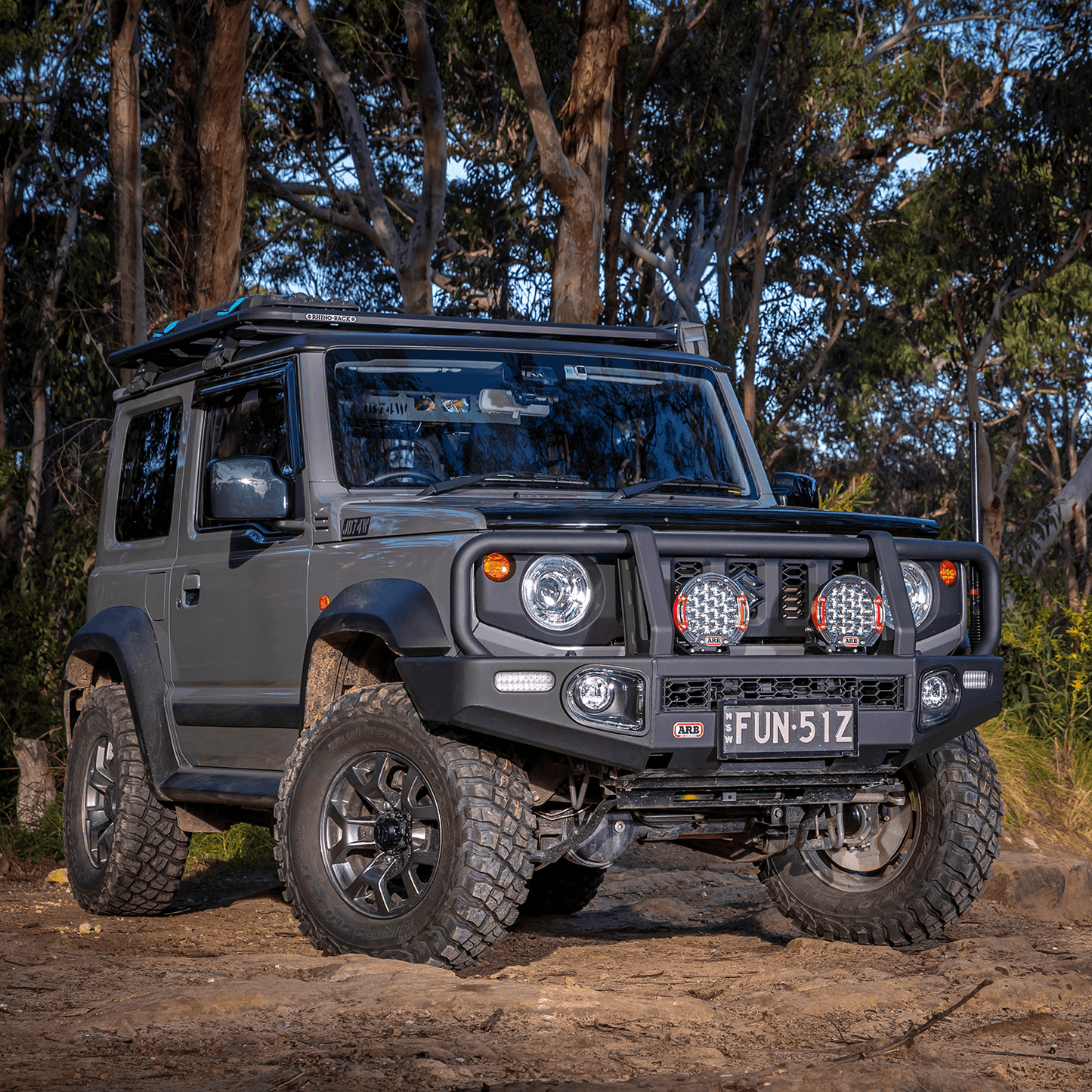 ARB Intensity Solis 21 Spot-Flood Driving Light Kit SJB21SFKIT mounted on 4x4 with heavy-duty bull bar and off-road tires