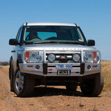 ARB Front Non-Winch Bumper 3232150B for Land Rover LR3 (2005-2009) with heavy-duty steel, upswept wings, and fitting kit included
