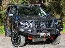 ARB Summit Front Winch Bumper 3438420B - Fitting Kit Included, heavy-duty steel, upswept wings, installed on Nissan 4x4 off-road vehicle