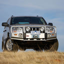 ARB Front Combination Bumper 3450130B for Jeep Grand Cherokee (1999-2007) - Fitting Kit Included with heavy-duty steel, black powder coat, and integrated light mounts