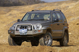 ARB Front Winch Bumper 3450190B for Jeep Liberty (2002-2005) - heavy-duty steel with fitting kit, black powder coat, upswept wing design