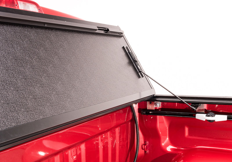 BAK BAKFlip G2 Hard Folding Tonneau Cover 226446 for Toyota Tacoma (24-ON) with textured panels and reinforced hinge system