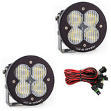 Baja Designs XL R Wide Cornering Pattern Sport Series LED Light Pods with heavy-duty mounts and wiring harness for off-road use