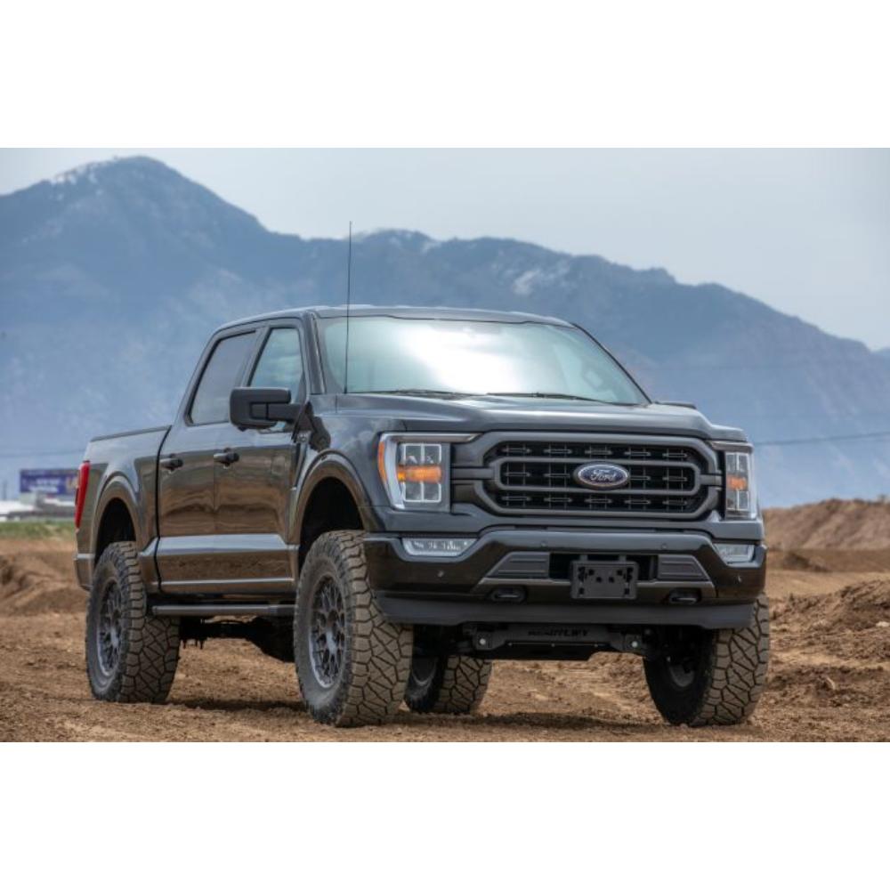 ReadyLift MAX3.3 6 inch Lift Kit for F-150 (21-24) installed on black Ford F-150 with heavy-duty suspension and off-road tires