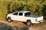 BAK BAKFlip G2 Hard Folding Tonneau Cover 226446 for Toyota Tacoma (24-ON) with textured black panels and low-profile design