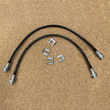 Load image into Gallery viewer, A pair of Mudify Front &amp; Rear Brake Lines for Toyota 4Runner 2003 ON, FJ Cruiser 2007-ON, Lexus GX460 2010-ON hoses for brake lines on a wooden surface.