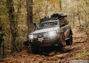 Dobinsons Side Steps With Side Rails - SR59-165 installed on rugged off-road 4x4 vehicle with heavy-duty chassis mounting legs
