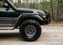 Dobinsons Side Steps With Side Rails - SR59-168 installed on rugged off-road 4x4 vehicle with heavy-duty chassis mounts
