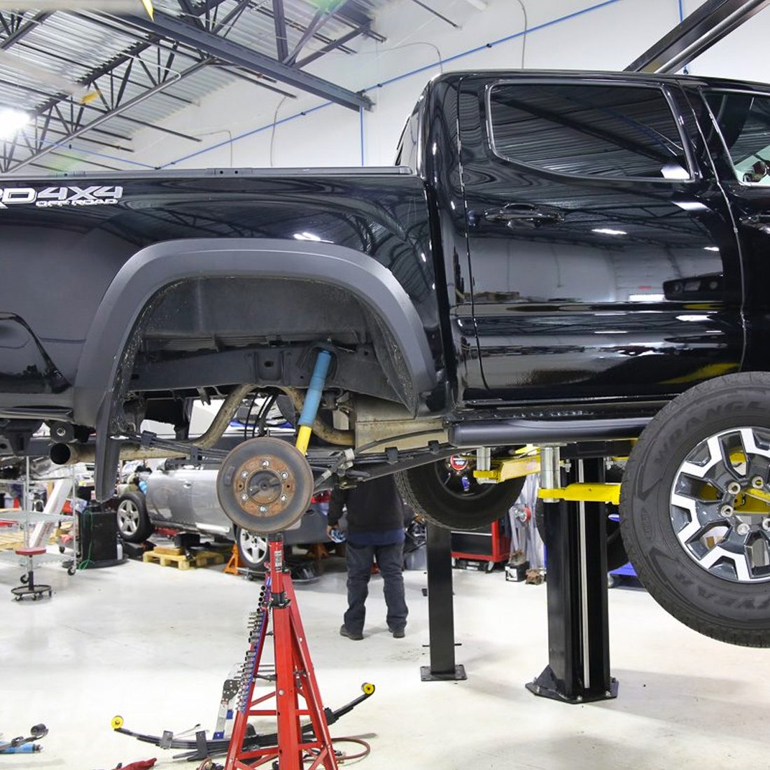 OME BP-51 2 inch Leveling Kit for Tacoma (05-23) installed with Old Man Emu heavy-duty rear shock and suspension components
