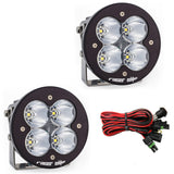 Baja Designs XL-R Racer Edition High Speed Spot Pair LED Light Pods with black aluminum housing and wiring harness for off-road use