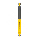 An Old Man Emu yellow and black shock absorber that enhances ride and handling performance on a white background.