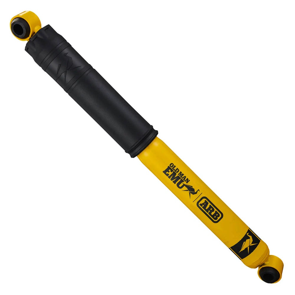 A yellow and black Old Man Emu Nitrocharger Sport Shock Absorber 60132 for Hilux Revo/Rocco (15-ON) with high-quality oil on a white background.