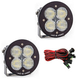 Baja Designs XL R Pro Series Wide Cornering Pattern LED Light Pods with mounting brackets and wiring harness for off-road use