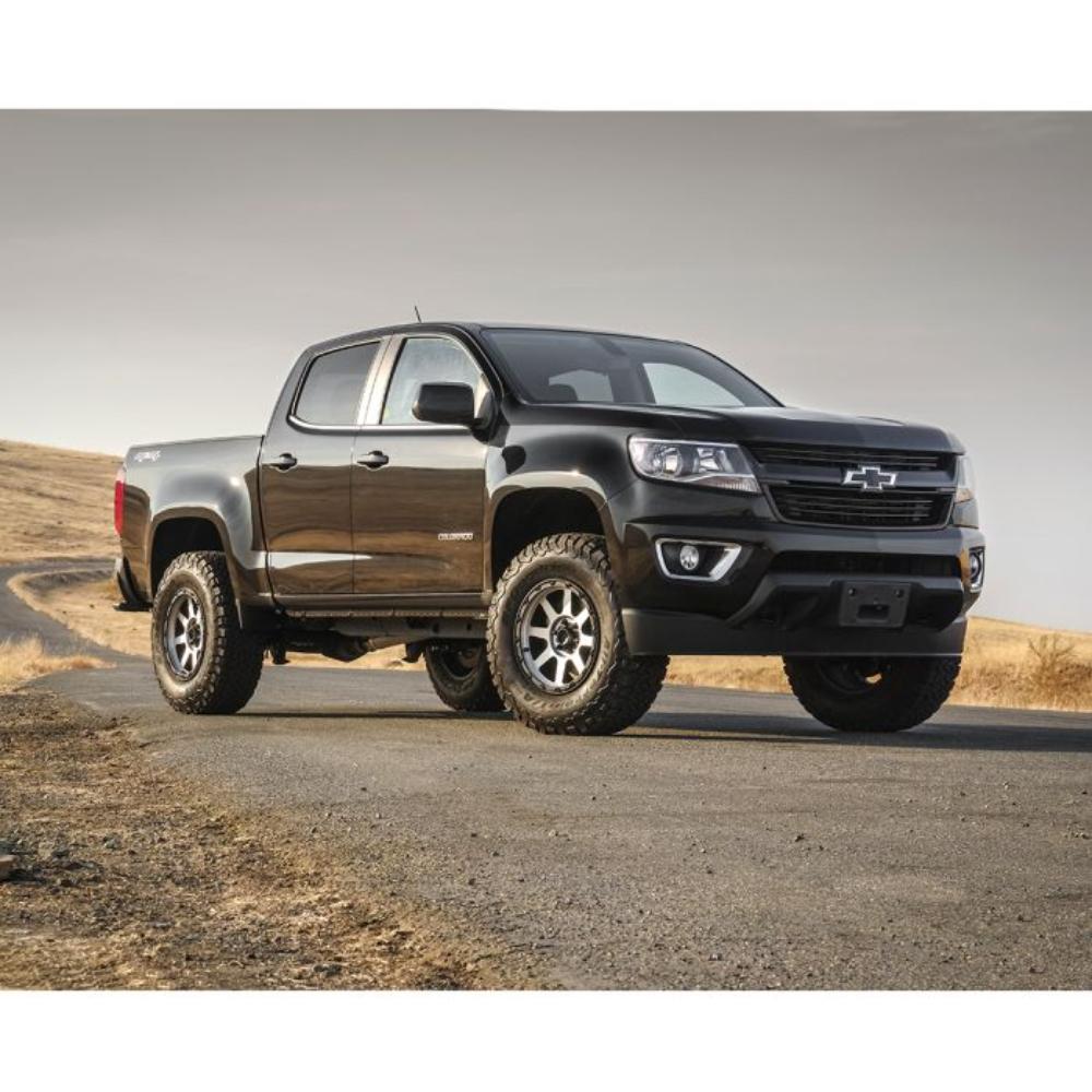 ReadyLift SST 3.5 inch Lift Kit for Colorado (15-22) installed on black 2015-2022 Chevy Colorado 4WD truck with off-road tires