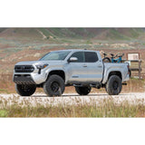 ReadyLift SST 3 inch Lift Kit for Tacoma (24-ON) installed on lifted 2024 Toyota Tacoma with off-road tires and bikes