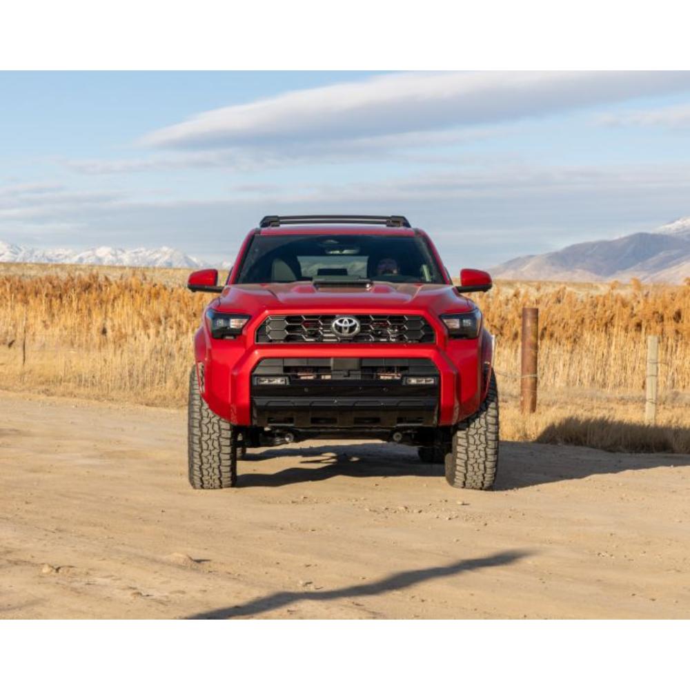 ReadyLift SST 2.5 inch Lift Kit for 4Runner (25-ON) on lifted red 2025 Toyota 4Runner with off-road tires outdoors