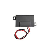 A black ARB LINX TPMS Comms Box 7450116 with wires attached to it, featuring a Bluetooth Communication Module for seamless integration with ARB TPMS tire sensors.