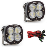 Baja Designs XL Pro Series Wide Cornering Pattern LED Light Pods with heavy-duty mounts and wiring harness for off-road use