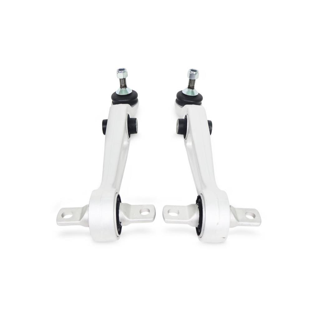 Pair of white suspension control arms with ball joints and bushings