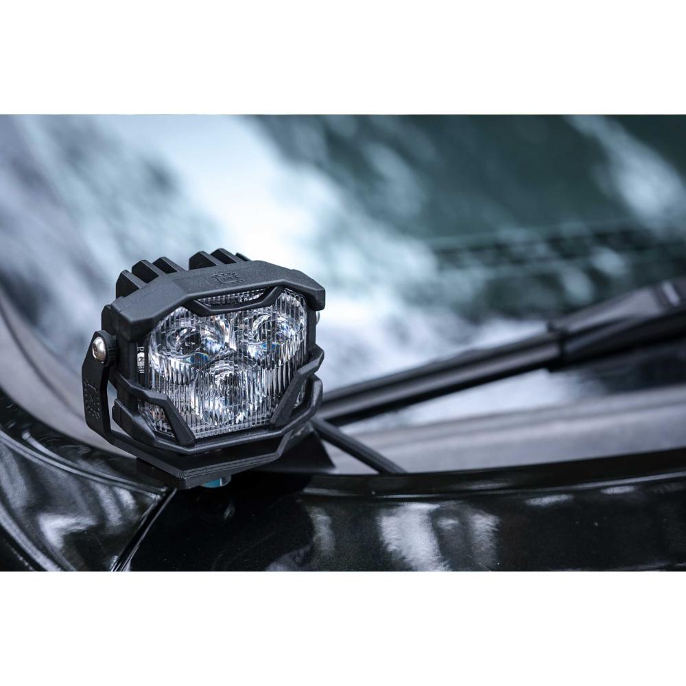 Morimoto 4Banger NCS LED Wide Beam Lights BAF005 mounted on black off-road vehicle hood with rugged housing and clear lens