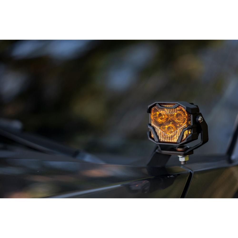 Morimoto 4Banger NCS LED Wide Beam Lights BAF006 amber lens mounted on rugged off-road vehicle hood with black housing
