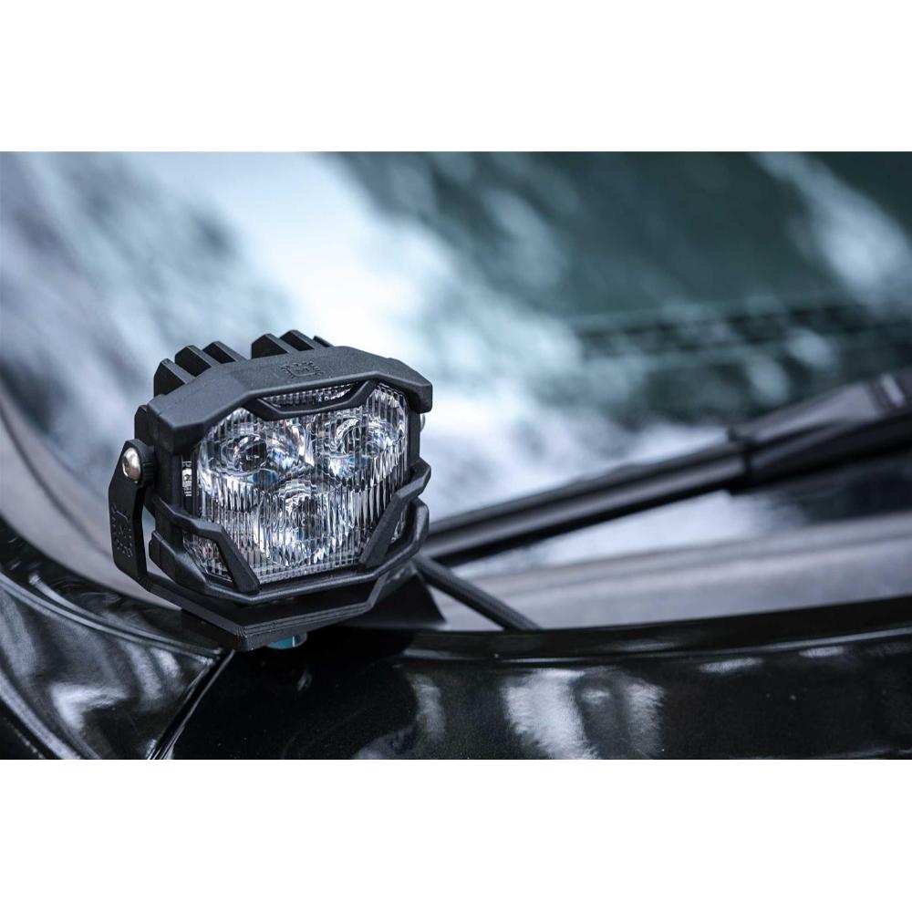 Morimoto 4Banger HXB LED Wide Beam Lights BAF011 compact LED light with adjustable dual-axis mounts on off-road vehicle hood
