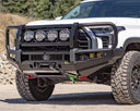Mudify Apex Triple Hoop Front Bumper for Toyota Tundra (2022+) with integrated LED lights and winch mount, heavy-duty steel construction.