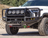 Mudify Apex Triple Hoop Front Bumper for Toyota Tundra (2022+) with integrated LED lights and winch mount, heavy-duty steel construction.