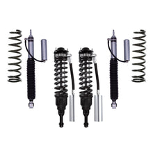 Load image into Gallery viewer, A high-performance suspension system, featuring the renowned Bilstein B8 8112 2.5 inch 4Runner (03-09) Lift Kit w/ OME Springs, specifically designed for off-road enthusiasts with a Jeep Wrangler.