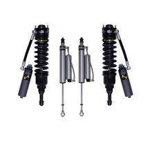Load image into Gallery viewer, A Bilstein B8 8112 0.6-2.5 inch Tacoma (05-23) Lift Kit w/ OME Leaf Springs off-road performance suspension system on a white background.