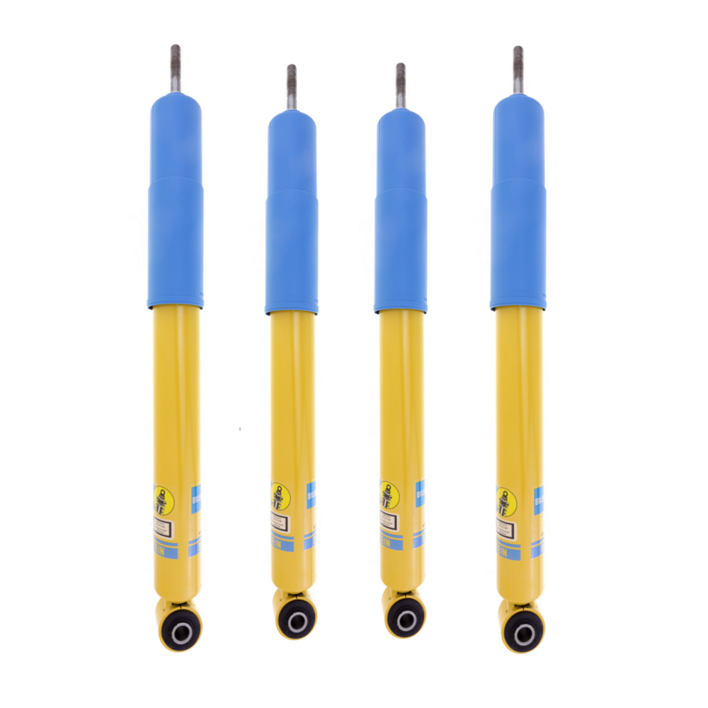 Bilstein B6 4600 Shocks Set for RAM 2500 (14-18), four heavy-duty blue and yellow suspension shocks
