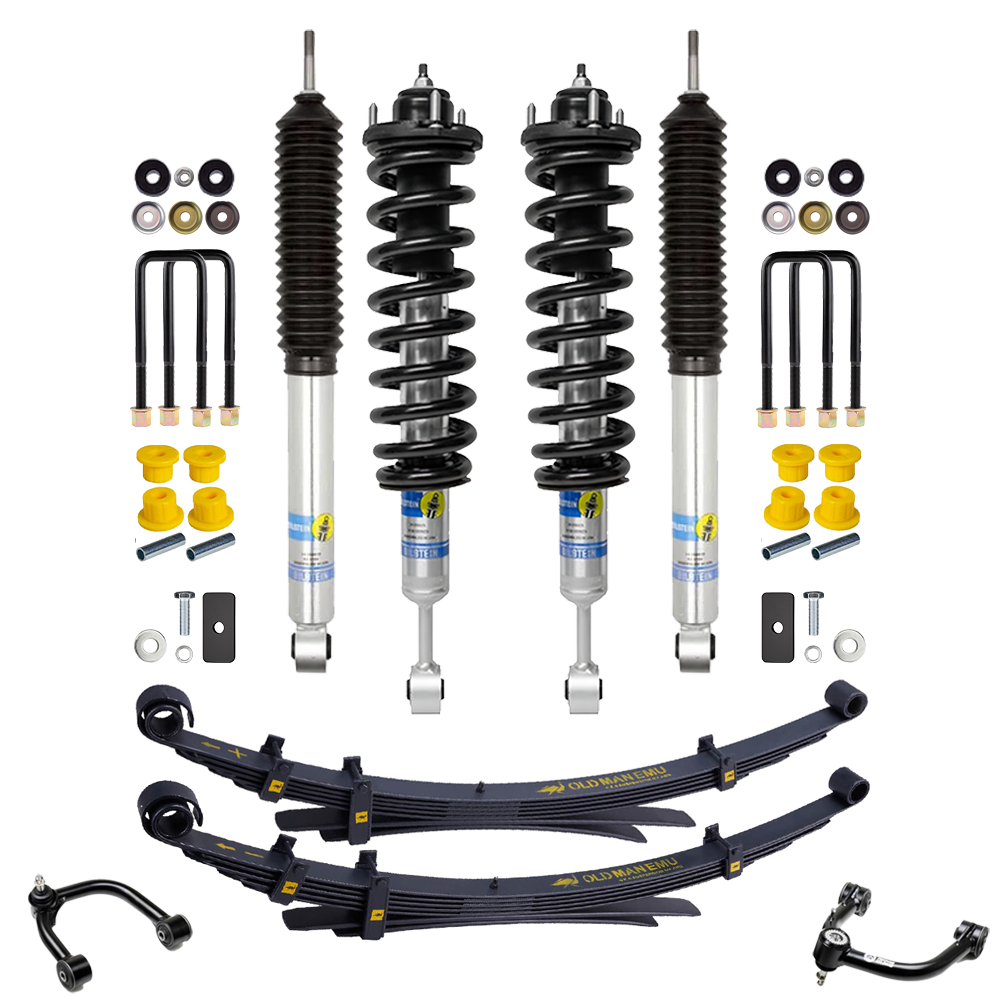 Off-road suspension components with four shocks, leaf springs, U-bolts, bushings, and mounting hardware