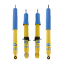 Bilstein blue and yellow shock absorbers arranged in a four piece suspension set