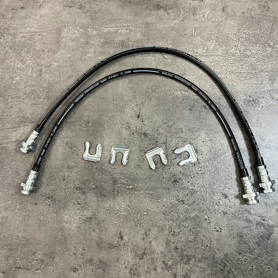A durable set of Mudify Extended Front Brake Lines for Toyota Tacoma 2005-ON, designed to withstand axle movement and ensure efficient brake lines.