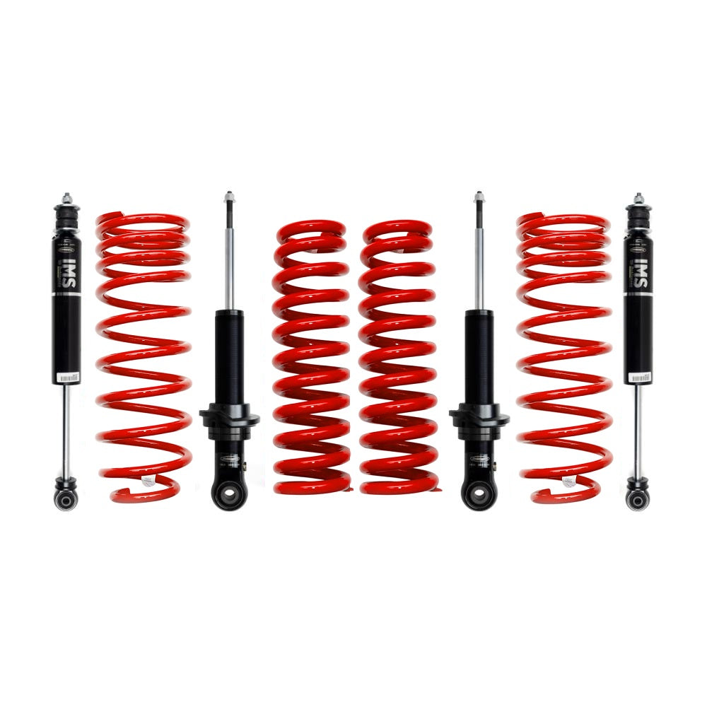 Off-road suspension kit with four red coil springs and four black shock absorbers