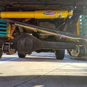 Dobinsons Steering Damper - SD45-801 installed on vintage Toyota Land Cruiser 60-80 Series with heavy-duty suspension components