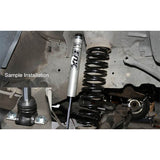 Fox Performance Series 2.0 Smooth Body Ifp Shock - 980-24-962 installed with heavy-duty coil spring on off-road truck suspension