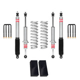 Eibach Stage 1 2.5 inch Lift Kit for Tacoma (05-15) with heavy-duty coil springs, shocks, blocks, and U-bolts for lifted suspension