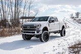 BDS 7 Inch Lift Kit w/ Radius Arm | Ford F250/F350 Super Duty (20-22) 4WD | Diesel with heavy-duty suspension components installed on snowy terrain