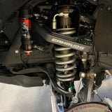 FOX 2.5 Performance 0-2" Leveling Kit for Tundra (07-21) with Fox remote reservoir shocks and heavy-duty coil spring suspension