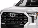AVS 22-23 Chevrolet Silverado 1500 Low Profile Acrylic Hood Shield - Chrome installed on front hood edge of white truck